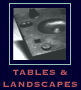 Picture of tables and landscape sculptures